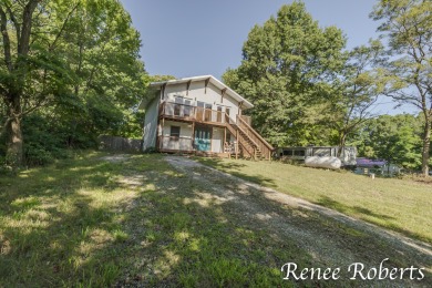 Discover country living in this 3-bedroom, 1.5-bath contemporary on Thoroughbred Golf Club in Michigan - for sale on GolfHomes.com, golf home, golf lot