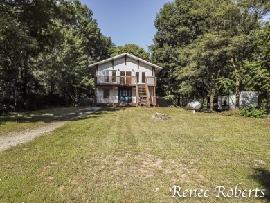 Discover country living in this 3-bedroom, 1.5-bath contemporary on Thoroughbred Golf Club in Michigan - for sale on GolfHomes.com, golf home, golf lot