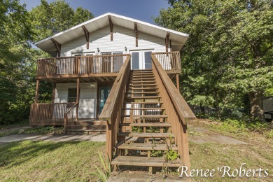 Discover country living in this 3-bedroom, 1.5-bath contemporary on Thoroughbred Golf Club in Michigan - for sale on GolfHomes.com, golf home, golf lot