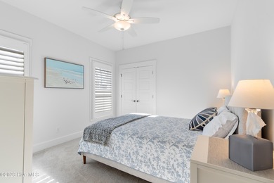 Welcome home to effortless coastal living in this move-in-ready on Members Club At St. James Plantation in North Carolina - for sale on GolfHomes.com, golf home, golf lot