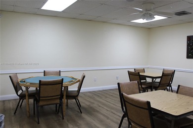 Dont miss this stunning 55+ community property, remodeled on Sunrise Lakes Phase IV Golf Course in Florida - for sale on GolfHomes.com, golf home, golf lot