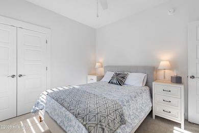 Welcome home to effortless coastal living in this move-in-ready on Members Club At St. James Plantation in North Carolina - for sale on GolfHomes.com, golf home, golf lot