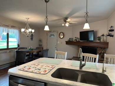 Let's take a look at this 3 bed, 2 bathroom with 3 car attached on Akron Golf Course in Iowa - for sale on GolfHomes.com, golf home, golf lot