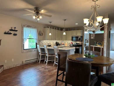 Let's take a look at this 3 bed, 2 bathroom with 3 car attached on Akron Golf Course in Iowa - for sale on GolfHomes.com, golf home, golf lot