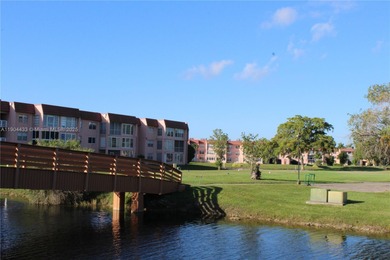 Dont miss this stunning 55+ community property, remodeled on Sunrise Lakes Phase IV Golf Course in Florida - for sale on GolfHomes.com, golf home, golf lot