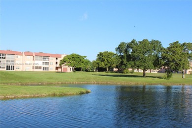 Dont miss this stunning 55+ community property, remodeled on Sunrise Lakes Phase IV Golf Course in Florida - for sale on GolfHomes.com, golf home, golf lot