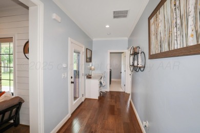 STUNNING HOME ON THE GOLF COURSE IN RIVER FALLS! You'll find on River Falls Par 3 Golf Course and Air Park in Texas - for sale on GolfHomes.com, golf home, golf lot