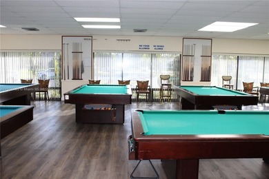 Dont miss this stunning 55+ community property, remodeled on Sunrise Lakes Phase IV Golf Course in Florida - for sale on GolfHomes.com, golf home, golf lot