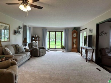 Let's take a look at this 3 bed, 2 bathroom with 3 car attached on Akron Golf Course in Iowa - for sale on GolfHomes.com, golf home, golf lot