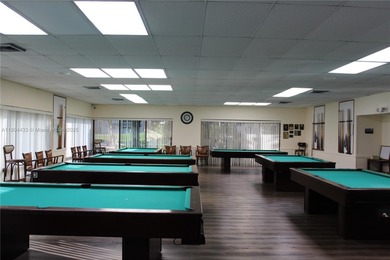 Dont miss this stunning 55+ community property, remodeled on Sunrise Lakes Phase IV Golf Course in Florida - for sale on GolfHomes.com, golf home, golf lot