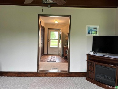 Let's take a look at this 3 bed, 2 bathroom with 3 car attached on Akron Golf Course in Iowa - for sale on GolfHomes.com, golf home, golf lot