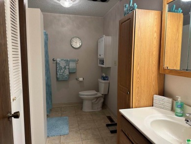 Let's take a look at this 3 bed, 2 bathroom with 3 car attached on Akron Golf Course in Iowa - for sale on GolfHomes.com, golf home, golf lot