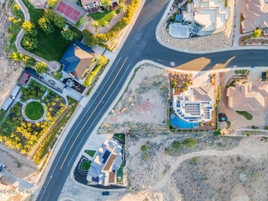 LOT WITH IT ALL: MOUNTAIN, CITY & GOLF COURSE VIEWS! This is on Entrada at Snow Canyon in Utah - for sale on GolfHomes.com, golf home, golf lot