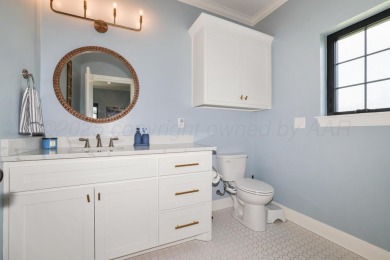 STUNNING HOME ON THE GOLF COURSE IN RIVER FALLS! You'll find on River Falls Par 3 Golf Course and Air Park in Texas - for sale on GolfHomes.com, golf home, golf lot