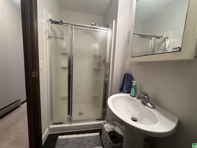 Let's take a look at this 3 bed, 2 bathroom with 3 car attached on Akron Golf Course in Iowa - for sale on GolfHomes.com, golf home, golf lot