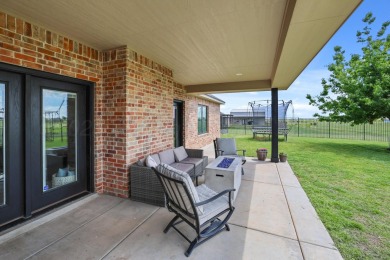 STUNNING HOME ON THE GOLF COURSE IN RIVER FALLS! You'll find on River Falls Par 3 Golf Course and Air Park in Texas - for sale on GolfHomes.com, golf home, golf lot
