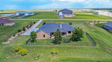 STUNNING HOME ON THE GOLF COURSE IN RIVER FALLS! You'll find on River Falls Par 3 Golf Course and Air Park in Texas - for sale on GolfHomes.com, golf home, golf lot