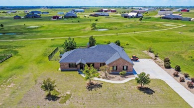 STUNNING HOME ON THE GOLF COURSE IN RIVER FALLS! You'll find on River Falls Par 3 Golf Course and Air Park in Texas - for sale on GolfHomes.com, golf home, golf lot