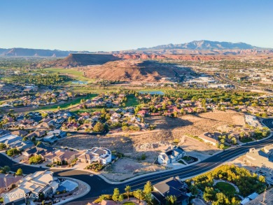 LOT WITH IT ALL: MOUNTAIN, CITY & GOLF COURSE VIEWS! This is on Entrada at Snow Canyon in Utah - for sale on GolfHomes.com, golf home, golf lot