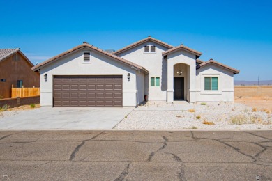 Step into modern luxury at 28412 Canal Avenue, Wellton, AZ. This on The Links At Coyote Wash in Arizona - for sale on GolfHomes.com, golf home, golf lot