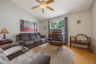 Experience breathtaking lake views from this adorable 3 bedroom on Mayfair Country Club in Florida - for sale on GolfHomes.com, golf home, golf lot