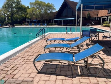 Come home to a truly unique one-bedroom end unit with stunning on Inverrary Country Club in Florida - for sale on GolfHomes.com, golf home, golf lot