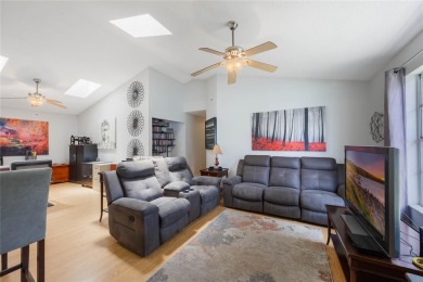 Experience breathtaking lake views from this adorable 3 bedroom on Mayfair Country Club in Florida - for sale on GolfHomes.com, golf home, golf lot