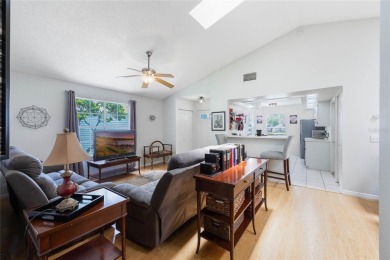 Experience breathtaking lake views from this adorable 3 bedroom on Mayfair Country Club in Florida - for sale on GolfHomes.com, golf home, golf lot