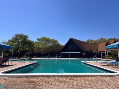 Come home to a truly unique one-bedroom end unit with stunning on Inverrary Country Club in Florida - for sale on GolfHomes.com, golf home, golf lot