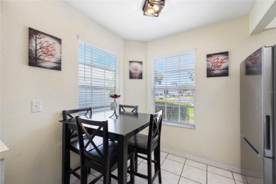 Experience breathtaking lake views from this adorable 3 bedroom on Mayfair Country Club in Florida - for sale on GolfHomes.com, golf home, golf lot