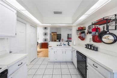 Experience breathtaking lake views from this adorable 3 bedroom on Mayfair Country Club in Florida - for sale on GolfHomes.com, golf home, golf lot