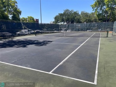 Come home to a truly unique one-bedroom end unit with stunning on Inverrary Country Club in Florida - for sale on GolfHomes.com, golf home, golf lot