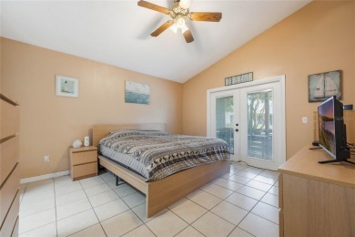 Experience breathtaking lake views from this adorable 3 bedroom on Mayfair Country Club in Florida - for sale on GolfHomes.com, golf home, golf lot