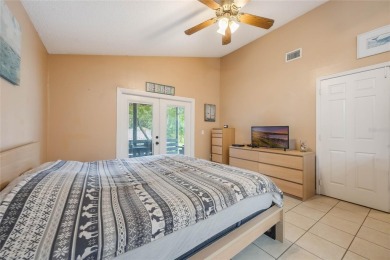 Experience breathtaking lake views from this adorable 3 bedroom on Mayfair Country Club in Florida - for sale on GolfHomes.com, golf home, golf lot