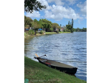Come home to a truly unique one-bedroom end unit with stunning on Inverrary Country Club in Florida - for sale on GolfHomes.com, golf home, golf lot