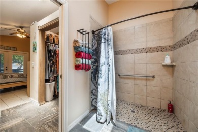 Experience breathtaking lake views from this adorable 3 bedroom on Mayfair Country Club in Florida - for sale on GolfHomes.com, golf home, golf lot
