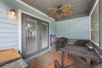 Experience breathtaking lake views from this adorable 3 bedroom on Mayfair Country Club in Florida - for sale on GolfHomes.com, golf home, golf lot