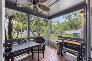 Experience breathtaking lake views from this adorable 3 bedroom on Mayfair Country Club in Florida - for sale on GolfHomes.com, golf home, golf lot