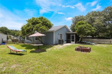 Experience breathtaking lake views from this adorable 3 bedroom on Mayfair Country Club in Florida - for sale on GolfHomes.com, golf home, golf lot