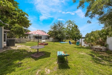 Experience breathtaking lake views from this adorable 3 bedroom on Mayfair Country Club in Florida - for sale on GolfHomes.com, golf home, golf lot