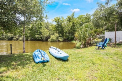 Experience breathtaking lake views from this adorable 3 bedroom on Mayfair Country Club in Florida - for sale on GolfHomes.com, golf home, golf lot