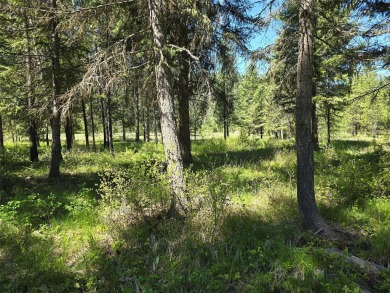 Nicely treed building lot in Western Montana! Lot is located in on Trestle Creek Golf Course in Montana - for sale on GolfHomes.com, golf home, golf lot