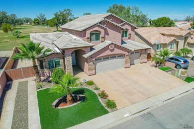 Welcome to your dream home! This spacious 2,451 sq. ft on Cocopah Rio Colorado Golf Course in Arizona - for sale on GolfHomes.com, golf home, golf lot