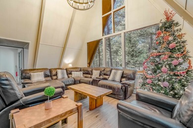 Welcome to 50 Knollwood Way, a quintessential A-frame chalet on Angel Fire Resort Country Club in New Mexico - for sale on GolfHomes.com, golf home, golf lot