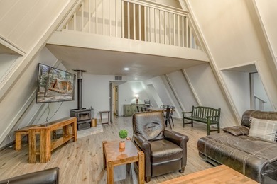 Welcome to 50 Knollwood Way, a quintessential A-frame chalet on Angel Fire Resort Country Club in New Mexico - for sale on GolfHomes.com, golf home, golf lot