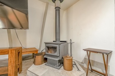 Welcome to 50 Knollwood Way, a quintessential A-frame chalet on Angel Fire Resort Country Club in New Mexico - for sale on GolfHomes.com, golf home, golf lot