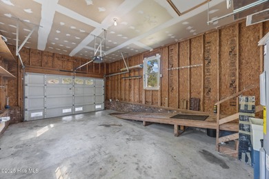 Tucked among the trees in the waterfront community of Fairfield on Harbour Point Golf Club in North Carolina - for sale on GolfHomes.com, golf home, golf lot