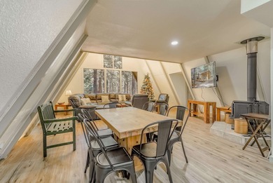 Welcome to 50 Knollwood Way, a quintessential A-frame chalet on Angel Fire Resort Country Club in New Mexico - for sale on GolfHomes.com, golf home, golf lot