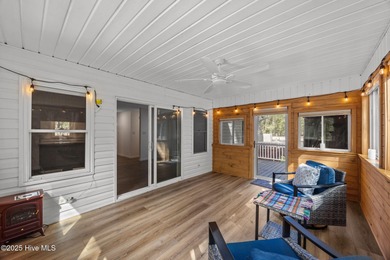 Tucked among the trees in the waterfront community of Fairfield on Harbour Point Golf Club in North Carolina - for sale on GolfHomes.com, golf home, golf lot