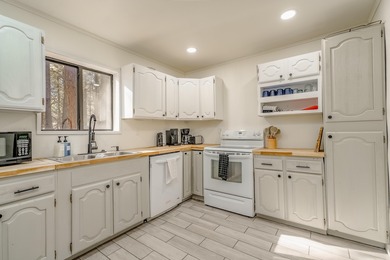 Welcome to 50 Knollwood Way, a quintessential A-frame chalet on Angel Fire Resort Country Club in New Mexico - for sale on GolfHomes.com, golf home, golf lot